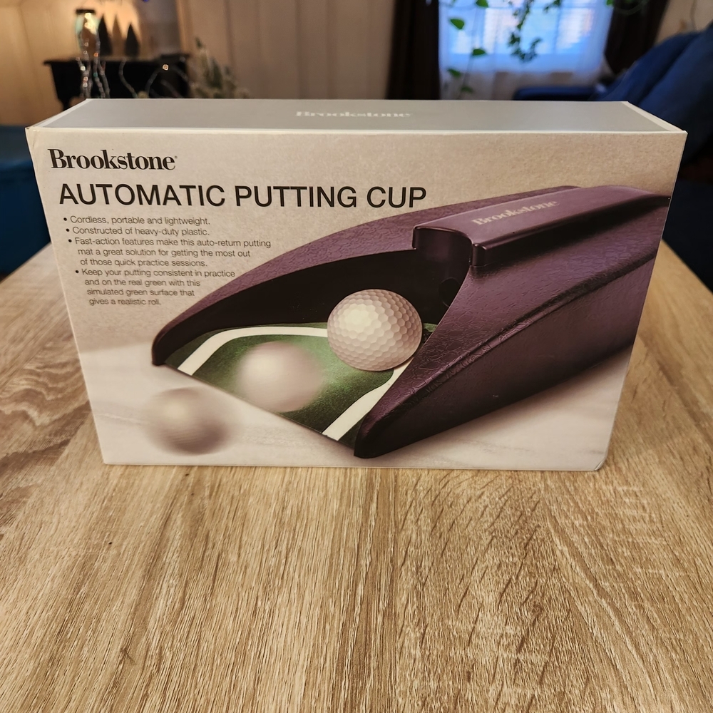 Brookstone Black Automatic Putting Cup